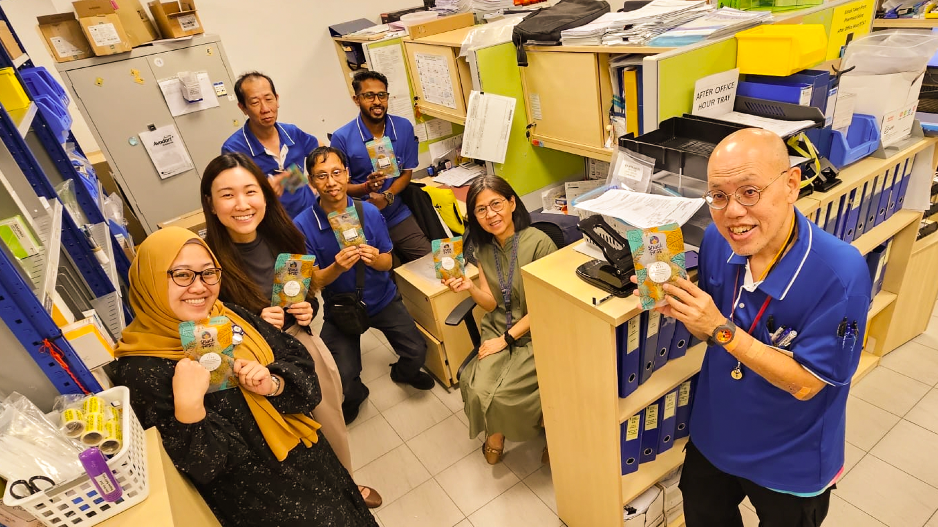 Image of ALPS staff with their Hari Raya festive goodies 